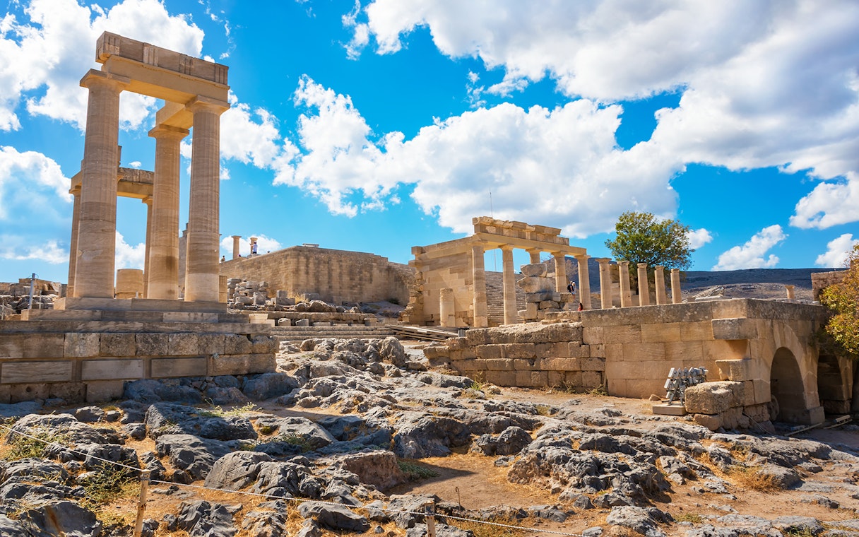 Acropolis of Lindos ruins under a blue sky, Rhodes, Greece.