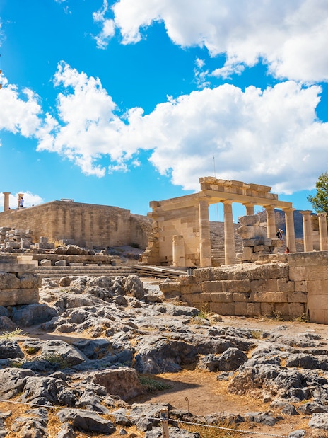 Acropolis of Lindos ruins under a blue sky, Rhodes, Greece.