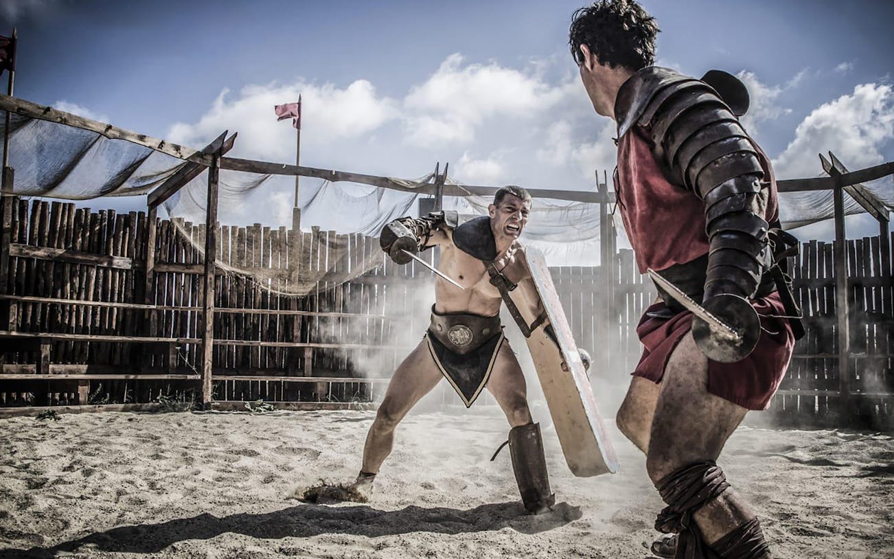 Gladiators reenacting a battle at Roma World, Italy.