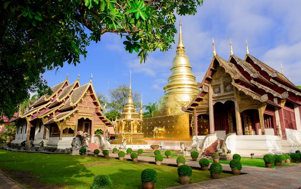 Tuk-tuk ride through Chiang Mai streets on a half-day guided tour.