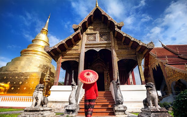 Tuk-tuk ride through Chiang Mai streets on a half-day guided tour.