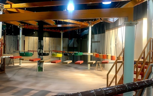 Tire swings and platforms at Waka Waka Safari-Themed Indoor Playground.