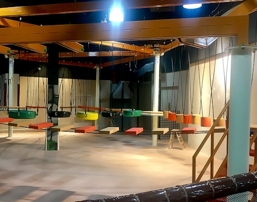 Tire swings and platforms at Waka Waka Safari-Themed Indoor Playground.