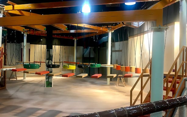 Tire swings and platforms at Waka Waka Safari-Themed Indoor Playground.