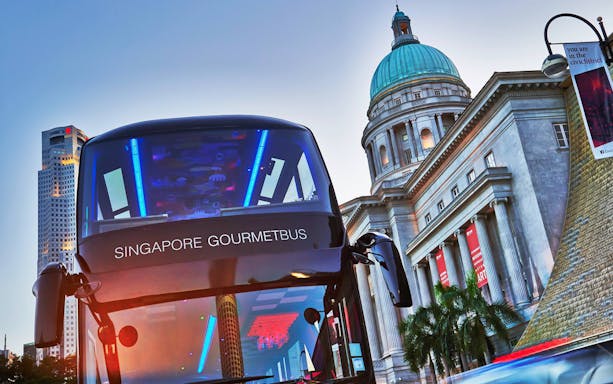 Singapore GOURMETbus in front of historic building in Civic District.