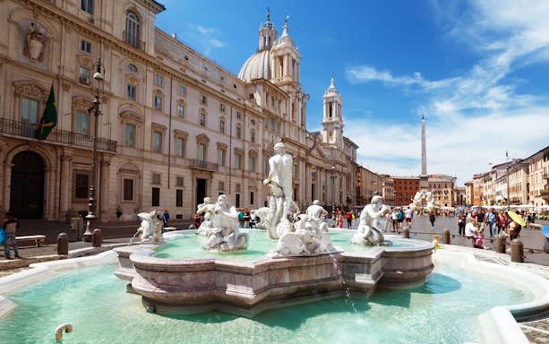 Piazza Navona with Fountain of Neptune on a sunny day in Rome.