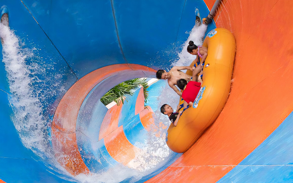 Visitors enjoying a water slide at Water World, i-City Shah Alam.