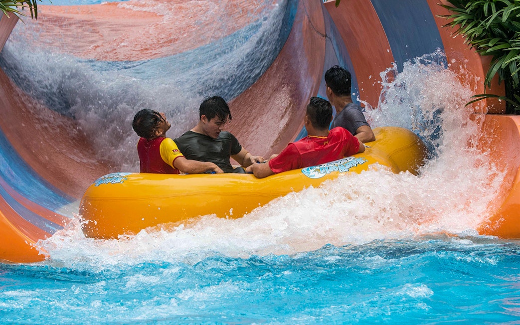Visitors enjoying a water slide at Water World, i-City Shah Alam.