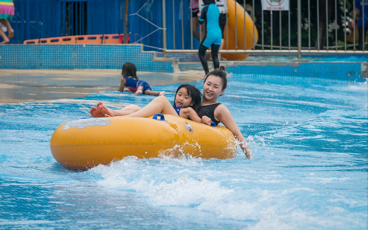 Family enjoying water ride at Water World, i-City Shah Alam.