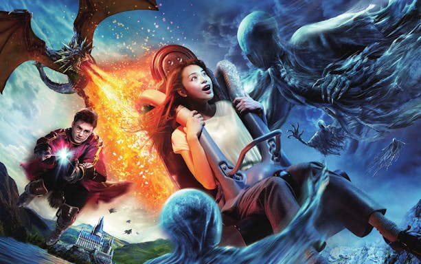 Roller coaster ride with mythical creatures at Universal Studios Japan.