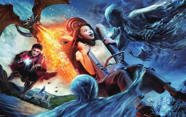 Thrilling ride with magical creatures at Universal Studios, featuring a dragon and wizard.