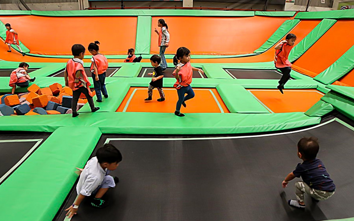 Children playing on trampolines at Jump Street Asia in Kuala Lumpur.
