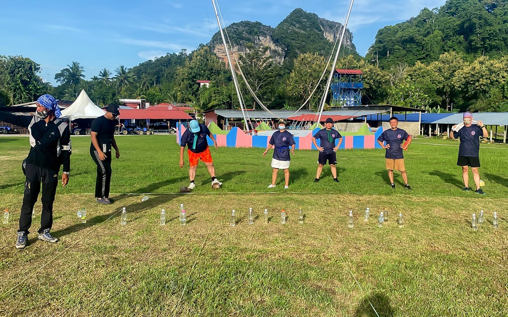 Participants engaging in a team-building activity at Langkawi Adventure & Xtreme Park.