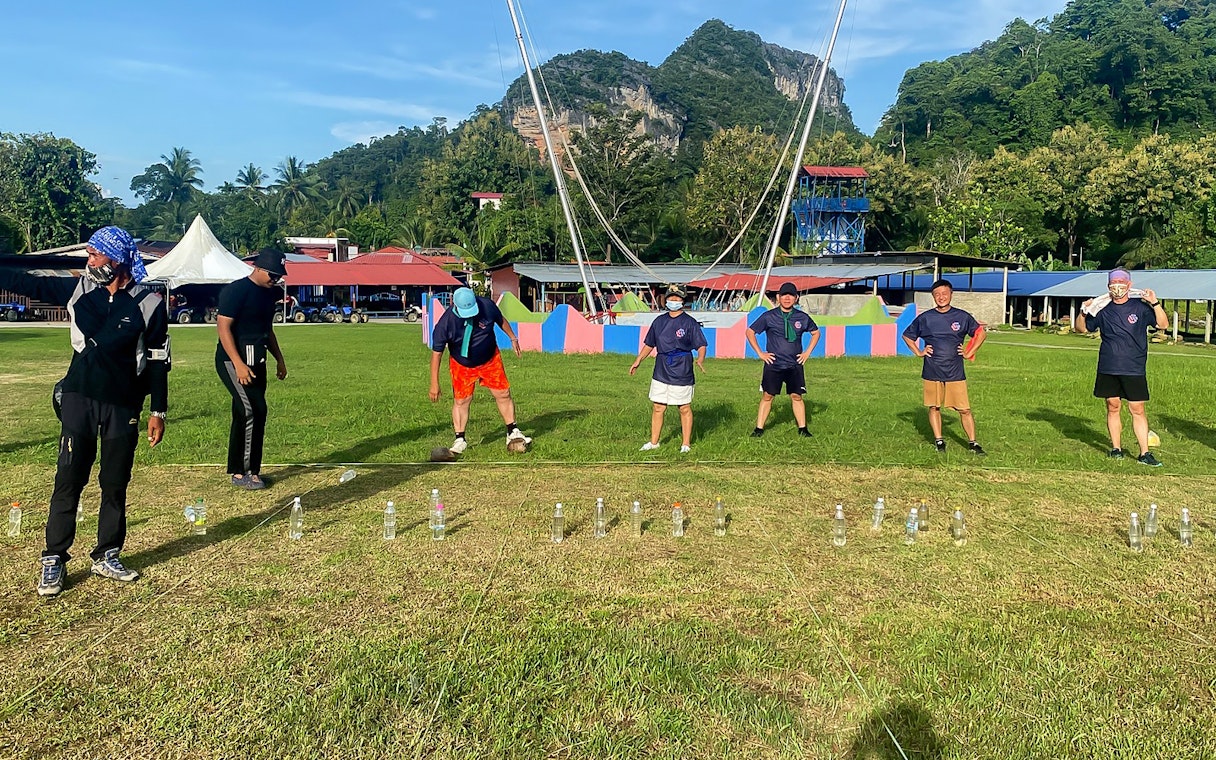 Participants engaging in a team-building activity at Langkawi Adventure & Xtreme Park.