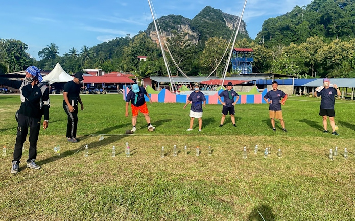 Participants engaging in a team-building activity at Langkawi Adventure & Xtreme Park.