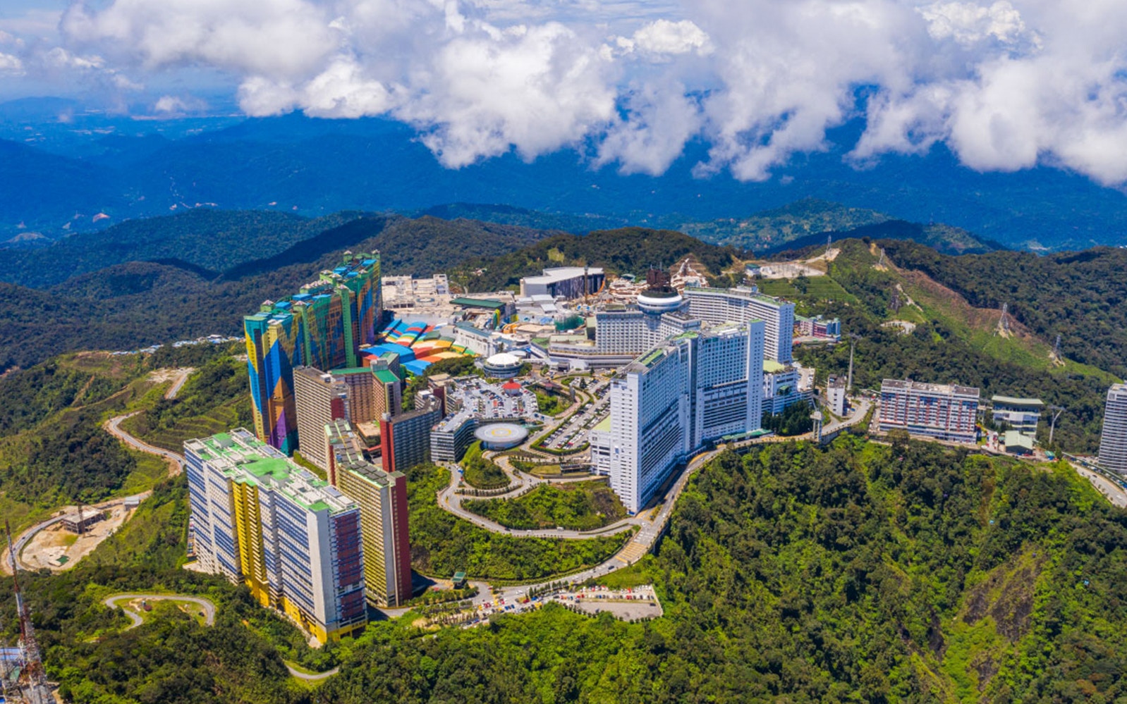 Aerial view of Genting SkyWorlds and Awana SkyWay Gondola in Malaysia's lush highlands.