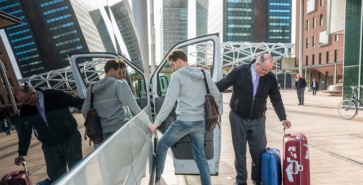 Passenger getting in the van