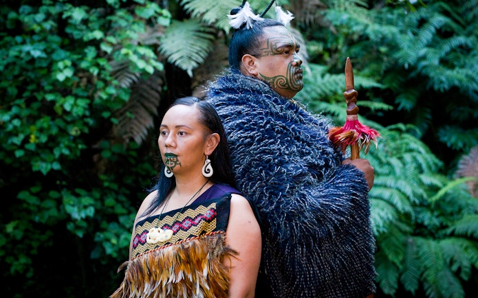 Maori performers in traditional attire at Mitai Maori Cultural Experience, New Zealand.