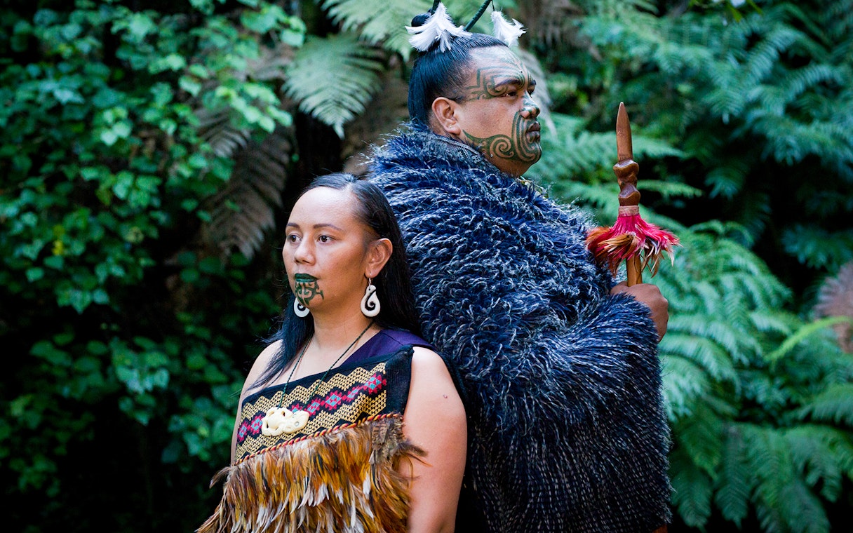 Maori performers in traditional attire at Mitai Maori Cultural Experience, New Zealand.