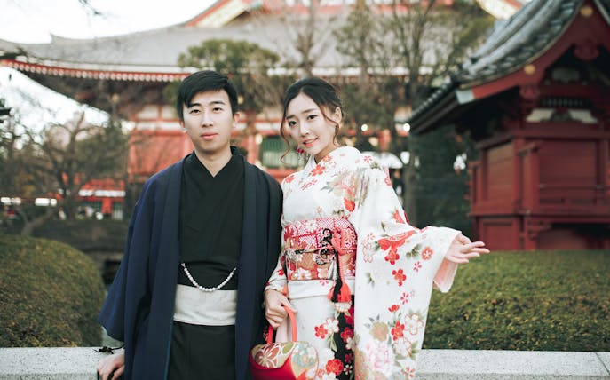 Couple in traditional kimonos at Senso-ji Temple, Tokyo.