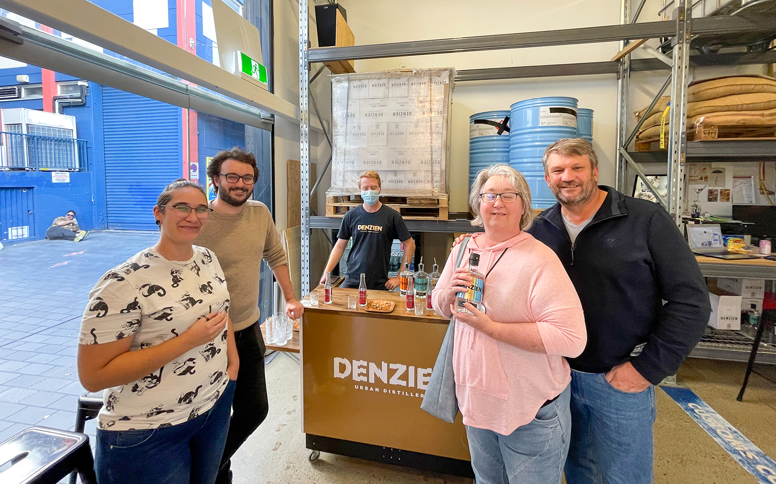 Group enjoying a tasting at Denzien Urban Distillery on the Foodie Delights Private Tour in Wellington.