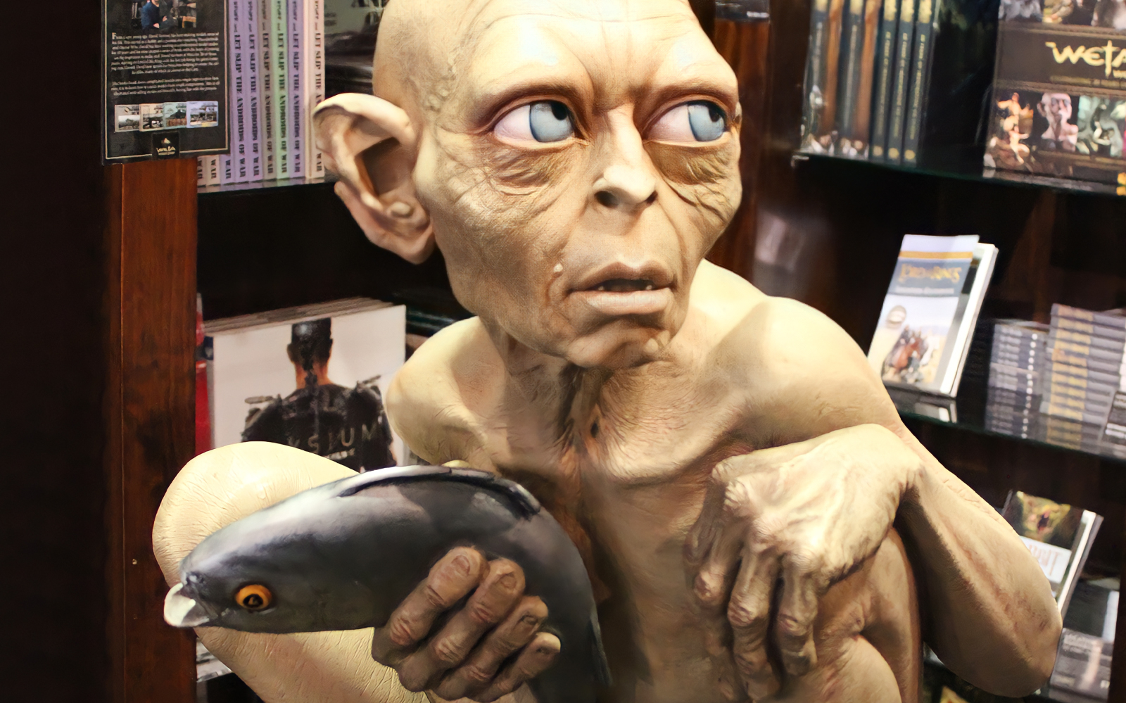 Wellington tour featuring a sculpture of a character holding a fish at Weta Workshop.