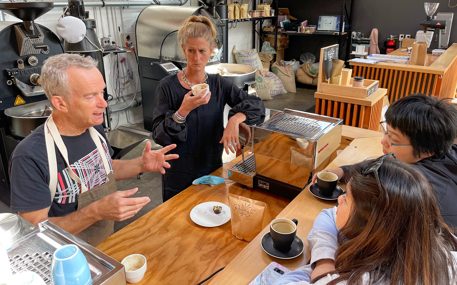 Coffee tasting session during a guided food tour on the Kāpiti Coast.
