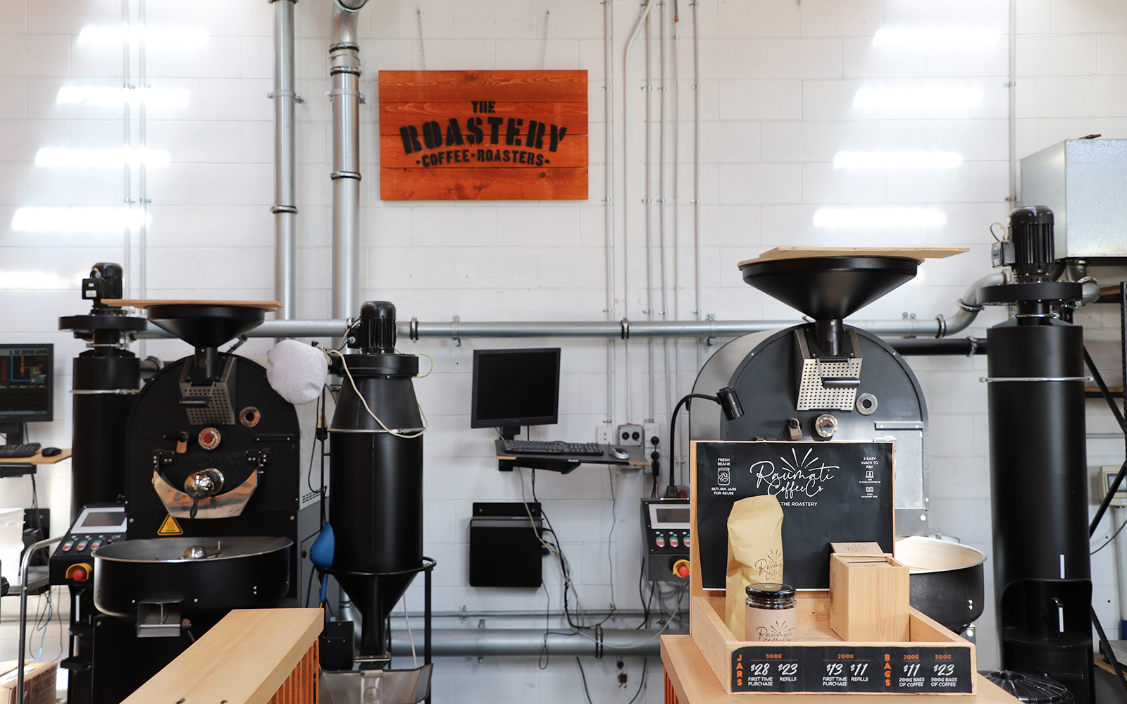 Coffee roasting equipment at a Kāpiti Coast roastery during a guided food tour.