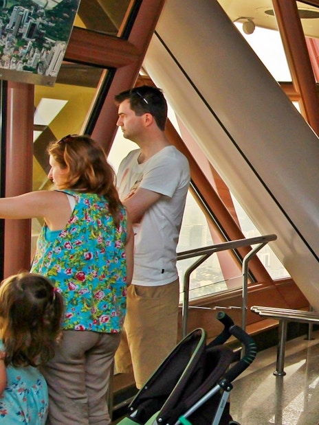 Visitors enjoying the view from KL Tower's Observation Deck in Malaysia.