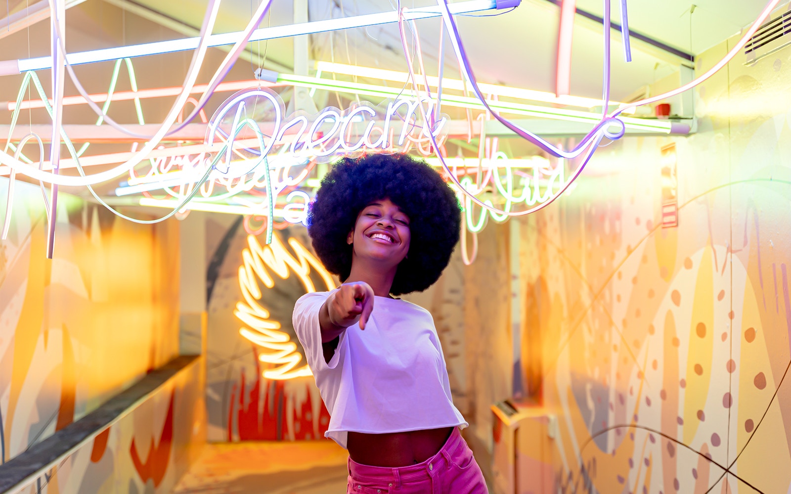 Visitors exploring interactive art installations at Ikono in Madrid.