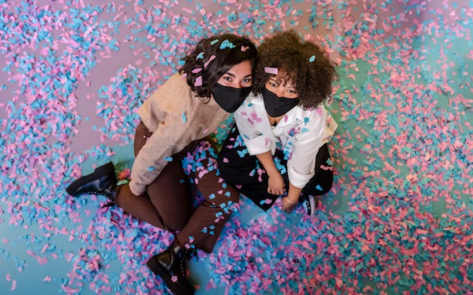 Visitors enjoying confetti room at Ikono in Madrid.