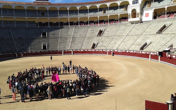 Visitors gather in the Las Ventas bullring during a guided tour in Madrid.