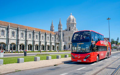 Lisbon hop-on hop-off bus in front of Jerónimos Monastery.