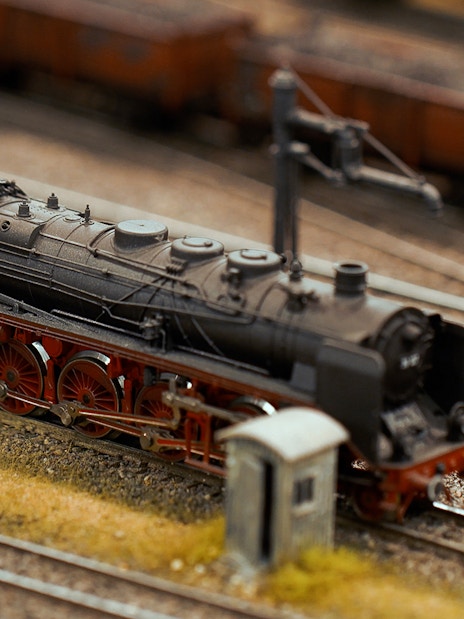 Miniature steam locomotive on tracks at Hzero Miniature Railway Museum.
