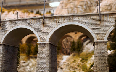 Miniature stone railway bridge at Hzero: The Miniature Railway Enterprise.
