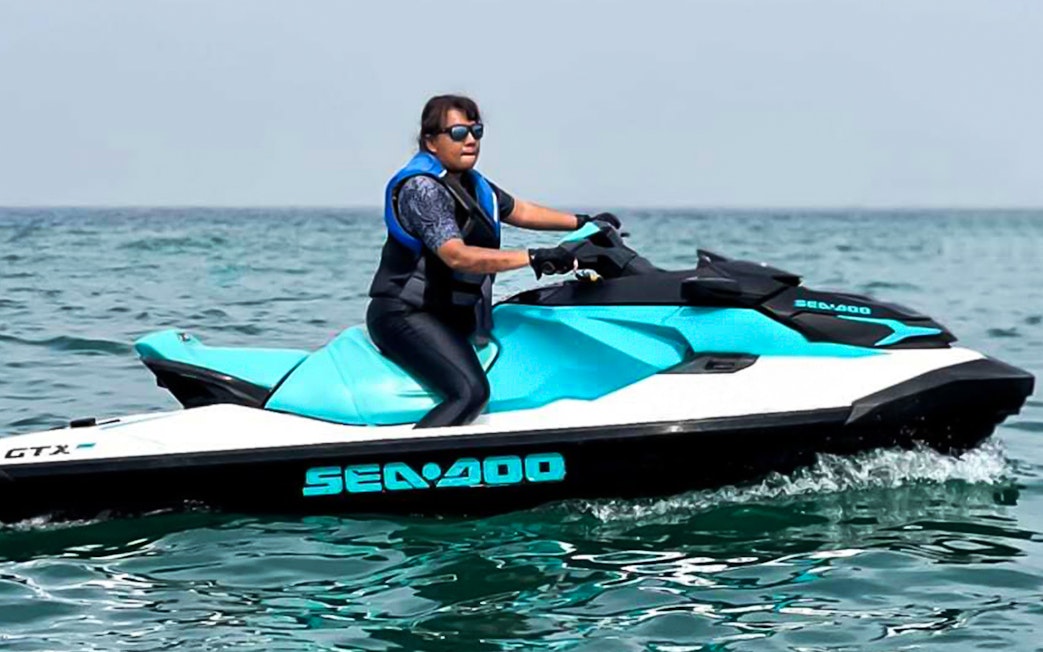 Person riding a jet ski on the ocean in Langkawi.