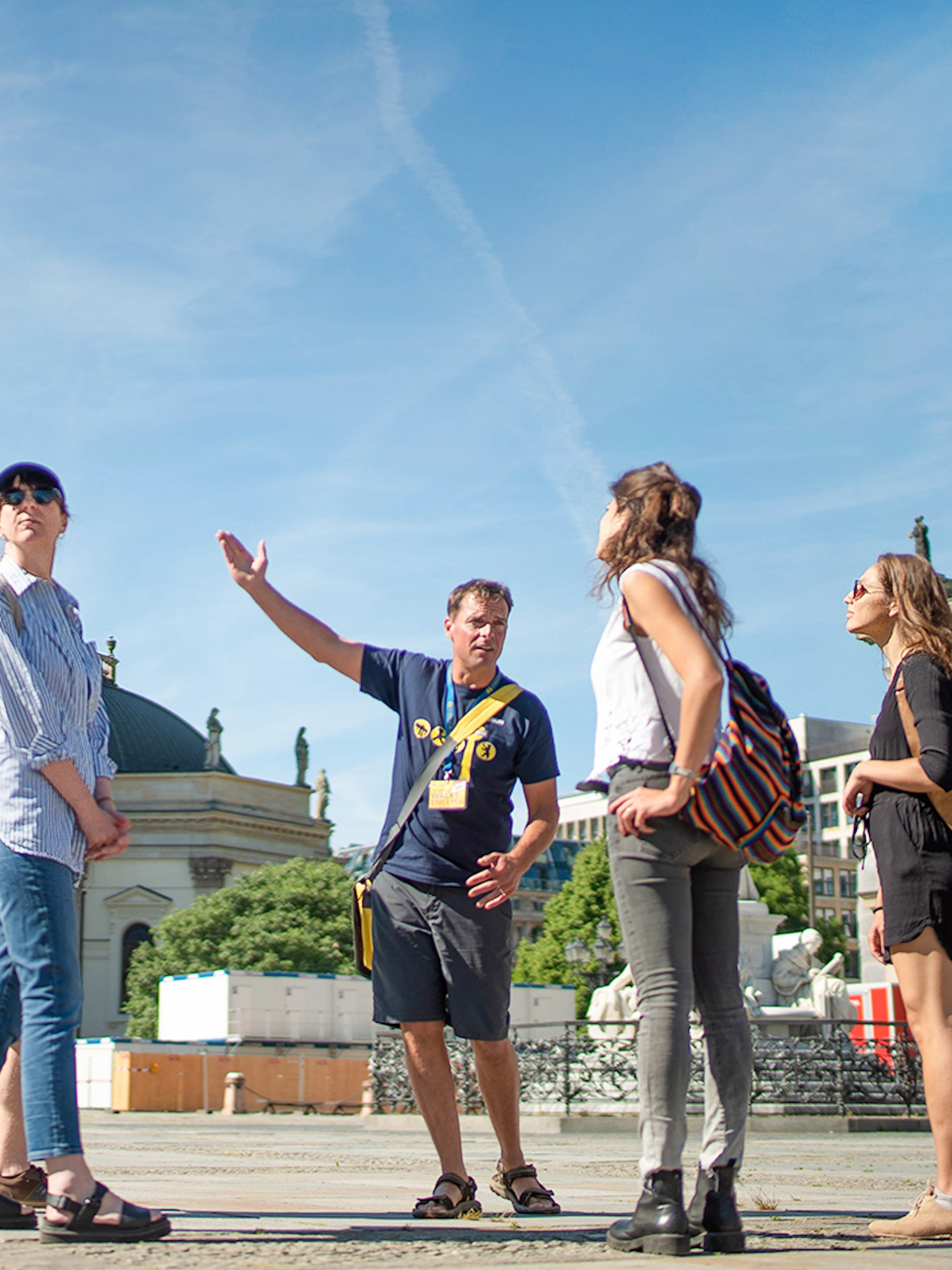 Tour group with guide at Gendarmenmarkt in Berlin.