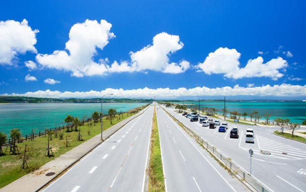 Okinawa coastal road with ocean views on the Hip Hop Bus Tour route.