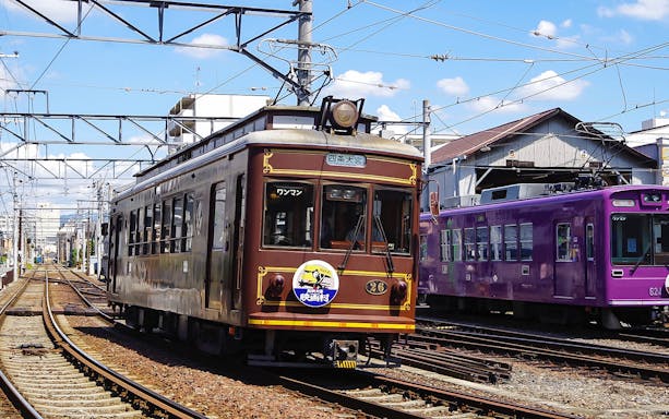 Historic Randen train at Toei Kyoto Studio Park station in Kyoto, Japan.
