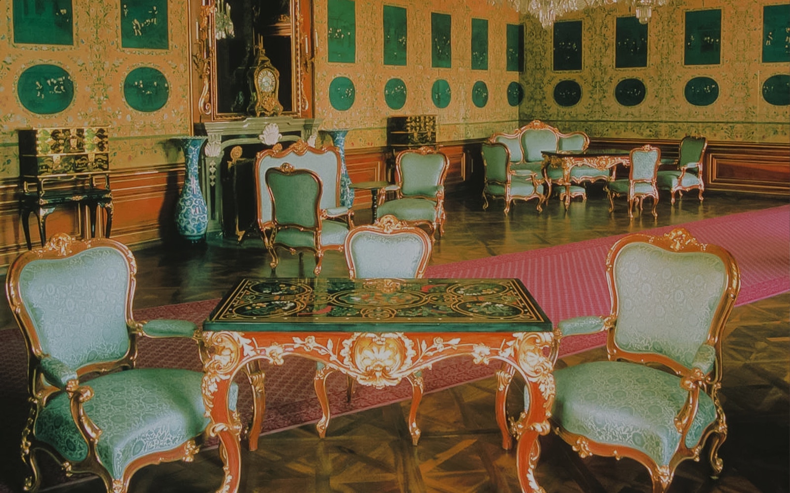 Schönbrunn Palace Blue Chinese Salon with ornate furniture and decorative wall panels.