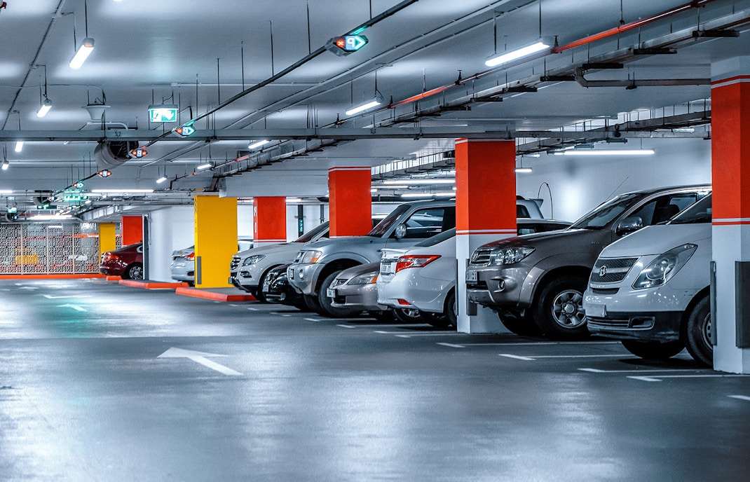 Underground parking area at Piazzale Roma, Venice with parked cars.