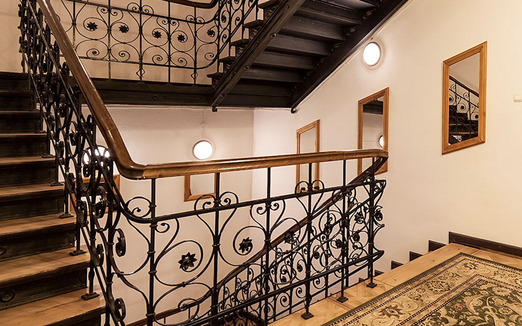 Ornate staircase in concert venue for Evening Chopin Piano Concert.