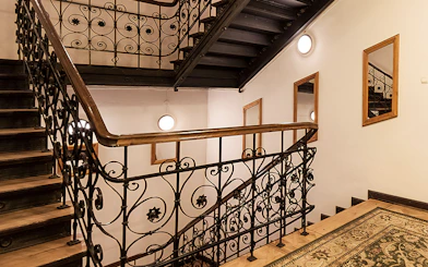 Ornate staircase in concert venue for Evening Chopin Piano Concert.