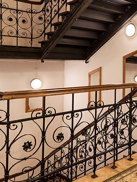 Ornate staircase in concert venue for Evening Chopin Piano Concert.