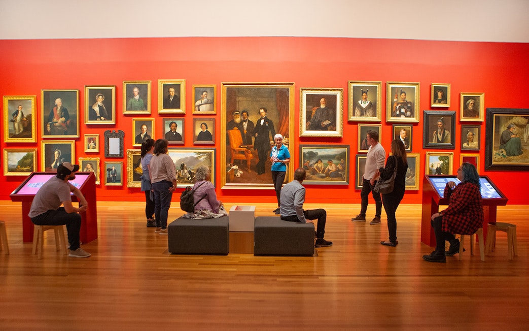 Visitors viewing art at Museum of New Zealand Te Papa Tongarewa.