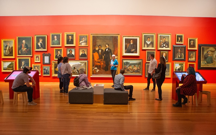 Visitors viewing art at Museum of New Zealand Te Papa Tongarewa.