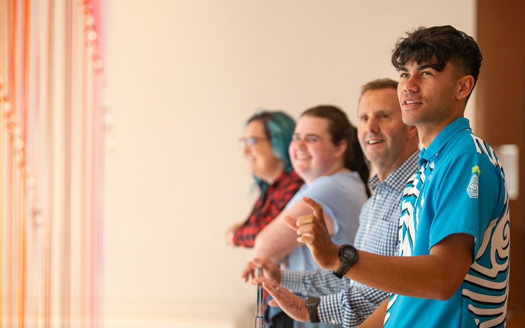 Visitors enjoying an exhibit at Museum of New Zealand Te Papa Tongarewa.