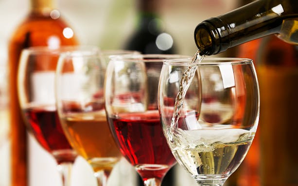 Wine glasses with various drinks on Budapest boat tour.