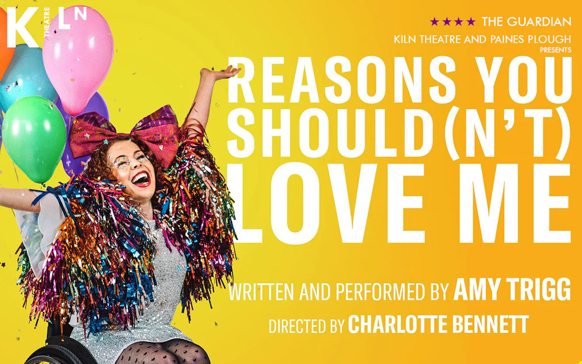 Performer in colorful costume with balloons, promoting "Reasons You Should(n’t) Love Me" at Kiln Theatre.