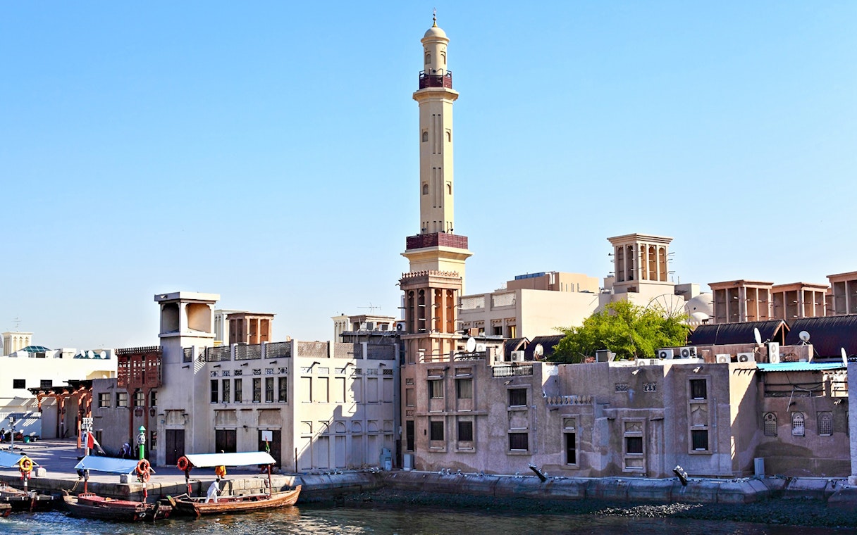 Historic Al Fahidi District with wind towers and minaret, Dubai.